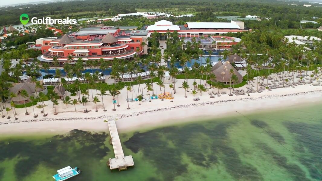 Barceló Bávaro Palace mega all-inclusive resort in Punta Cana with expansive pools, white sand beach, and grand architecture.
