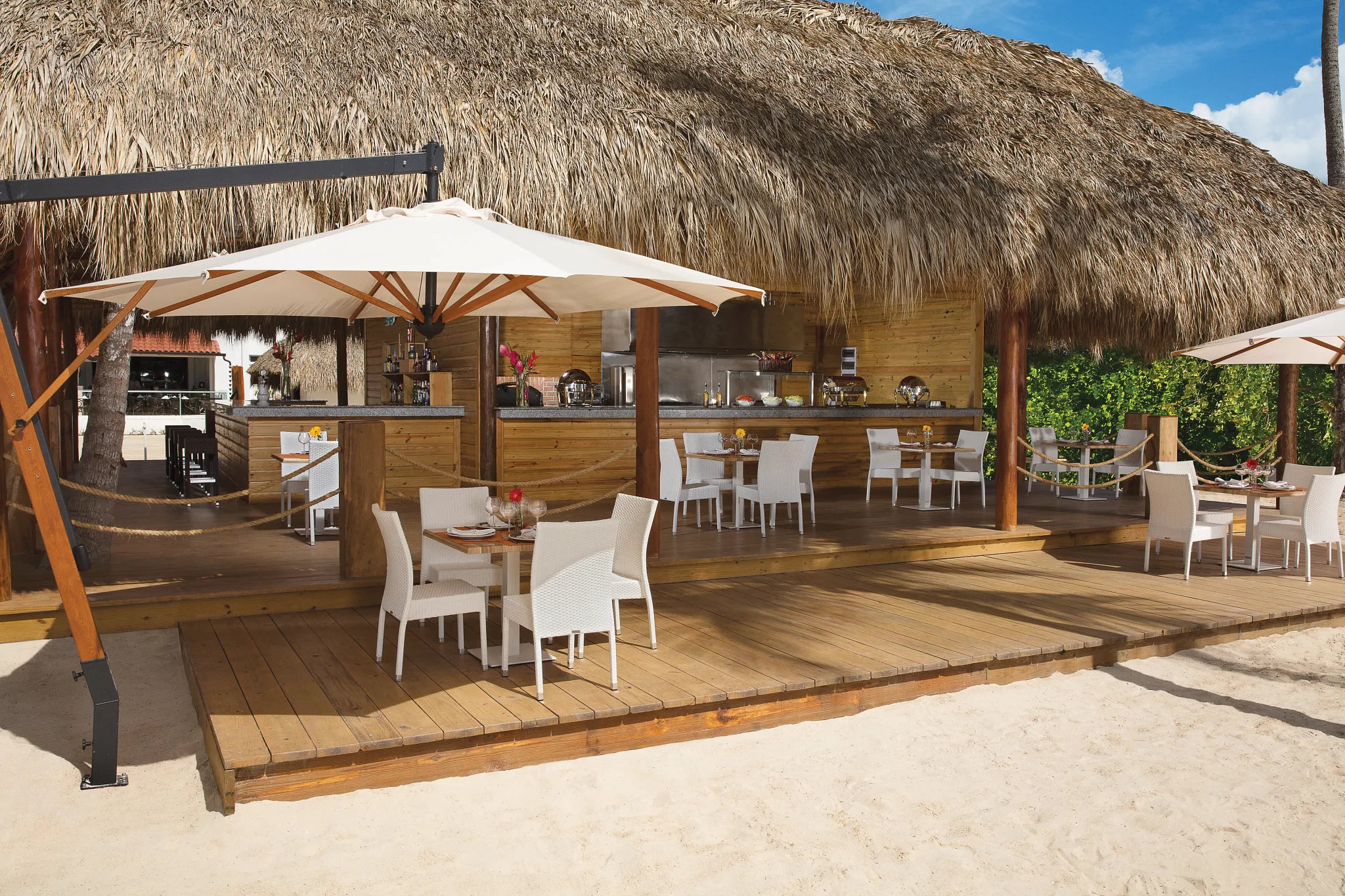 Barefoot Grill at Dreams Dominicus La Romana featuring casual beachfront dining, grilled favorites, and tropical outdoor seating near the pool.