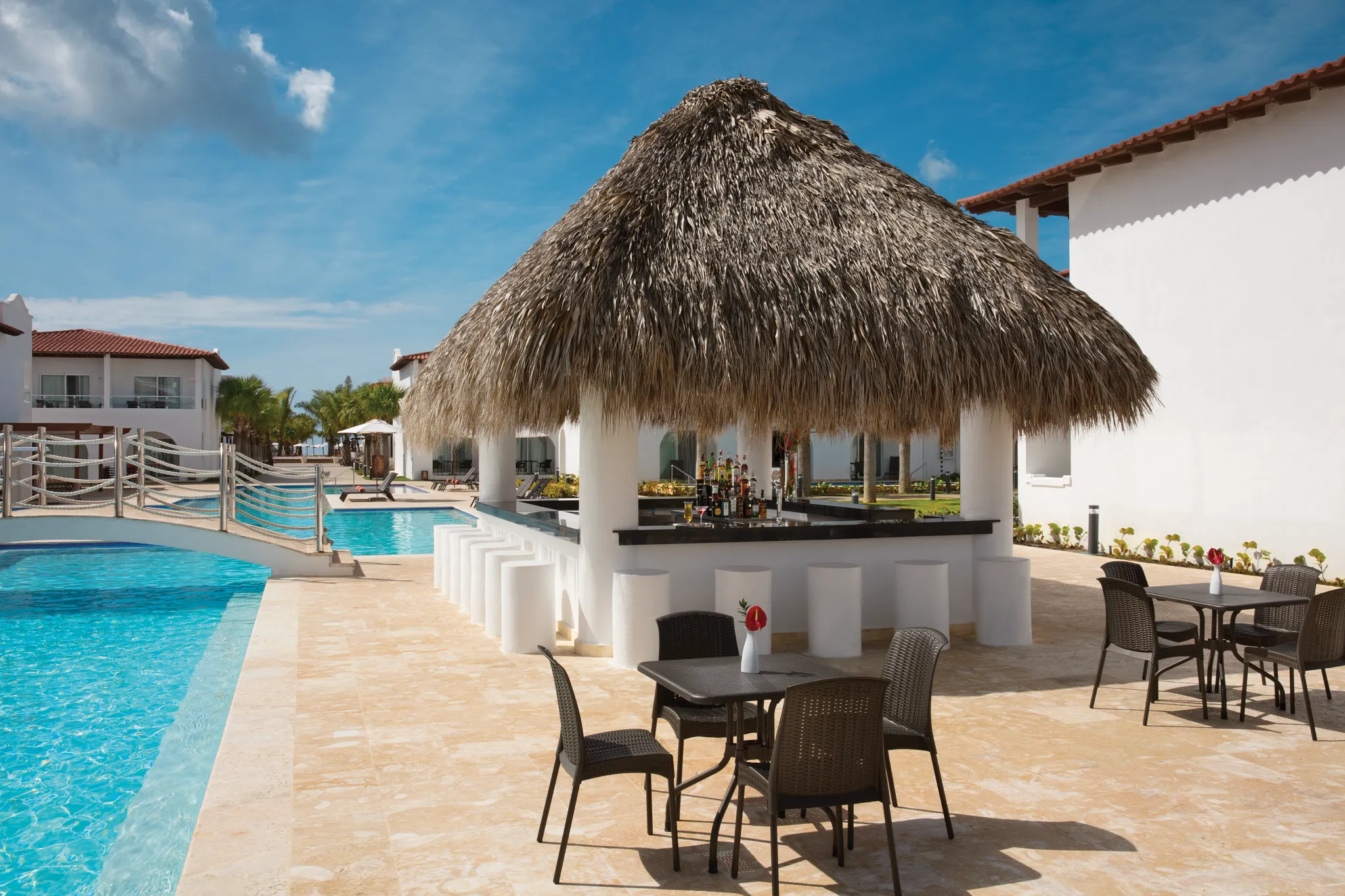 Barracuda beach bar at Dreams Dominicus La Romana featuring tropical cocktails, ocean views, and relaxed seaside seating.