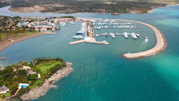 Casa de Campo Marina near Dreams Dominicus La Romana with luxury yachts, waterfront dining, and marina views