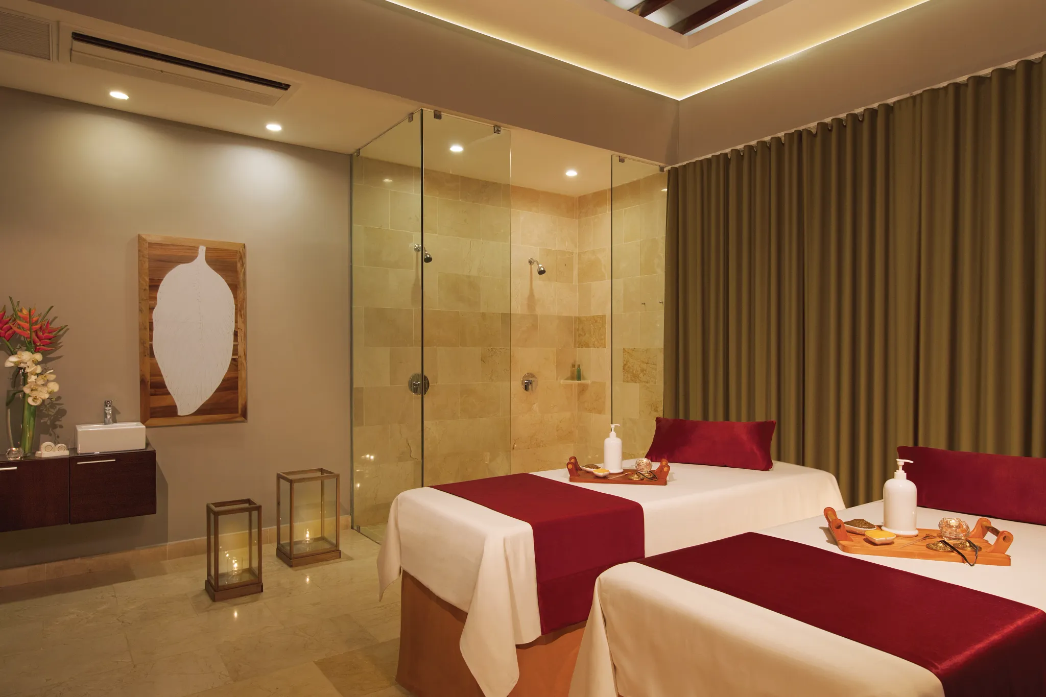 Luxury couples massage treatment room at Dreams Dominicus La Romana spa.
