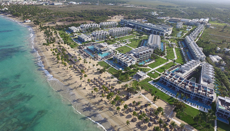 Excellence El Carmen adults-only all-inclusive resort in Punta Cana with luxury pools, pristine beach, and romantic Caribbean setting.