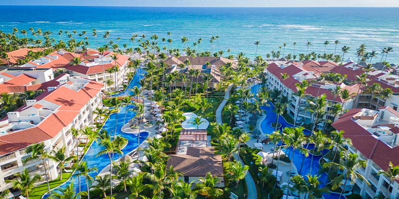 Majestic Colonial Punta Cana all-inclusive beachfront resort with lagoon-style pools and tropical landscaping.
