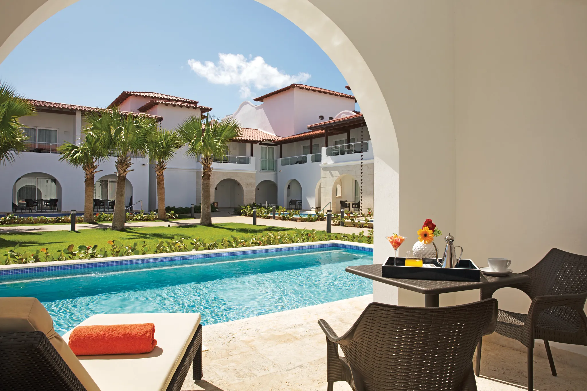 Private swim-up terrace with plunge pool at Preferred Club Deluxe Swim-Up suite at Dreams Dominicus La Romana.