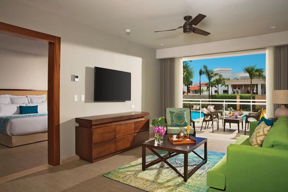 Preferred Club Family Suite Tropical View living area with sofa bed at Dreams Dominicus La Romana.