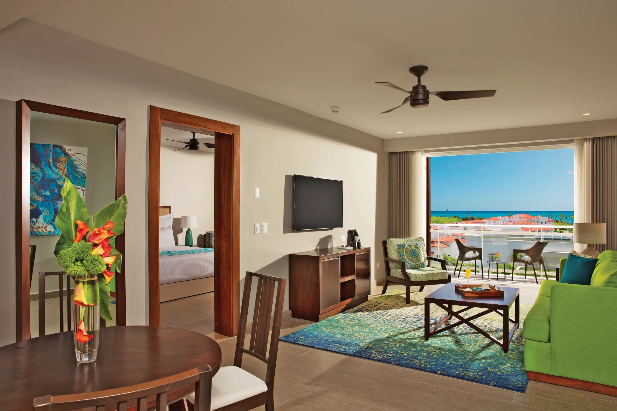 Preferred Club Three Bedroom Family Suite Tropical View living and dining area at Dreams Dominicus La Romana.
