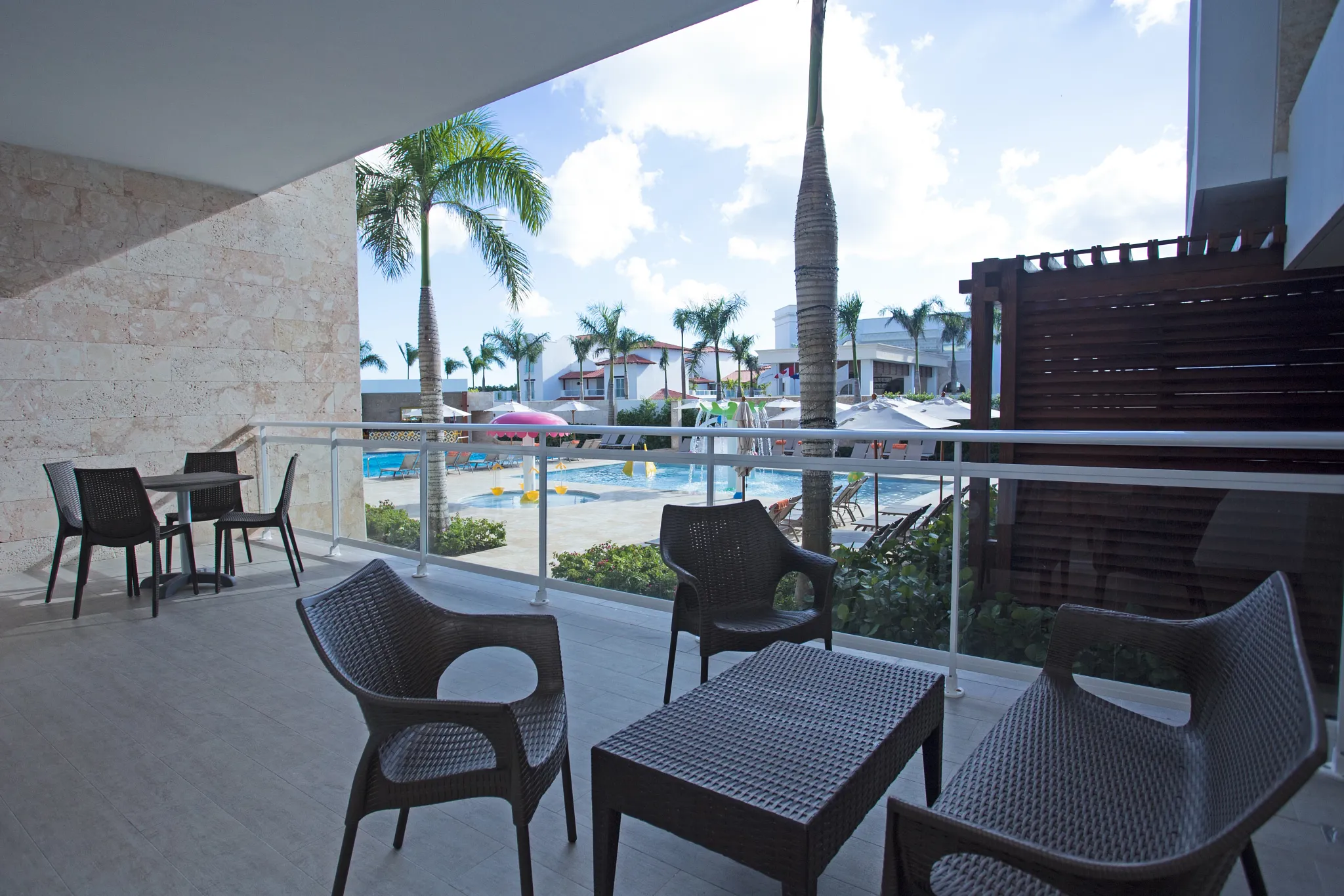 Preferred Club Two Bedroom Family Suite Tropical View balcony overlooking tropical resort grounds at Dreams Dominicus La Romana.